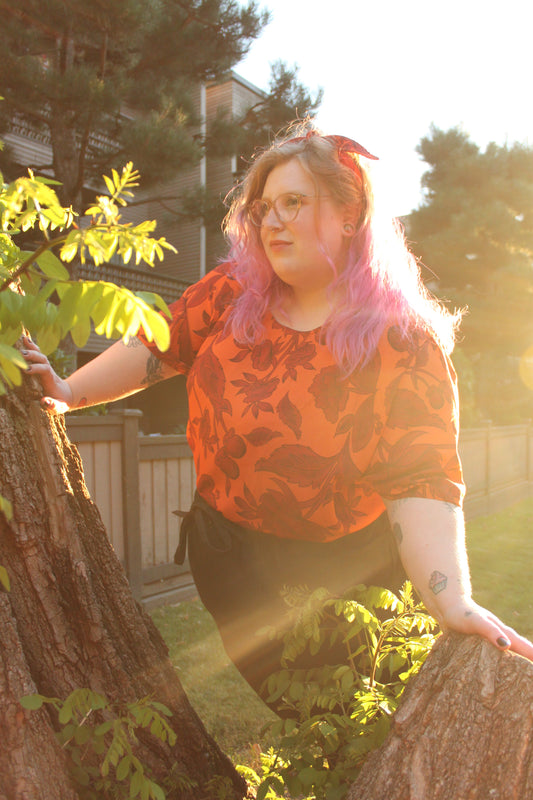 We feature another stunning golden hour shot with Meg wearing our Walker Shirt crafted from Tencil Twill in Neroli. This shirt is breathable and wrinkle-free, making it a great option for indoor and outdoor wear.